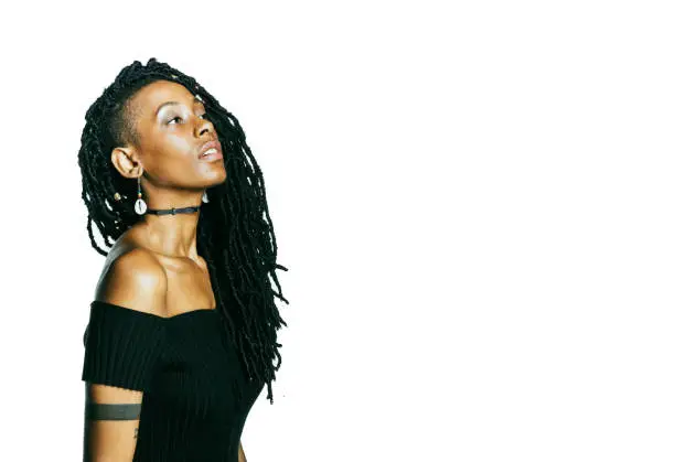 African American woman with dreadlocks looking at the camera