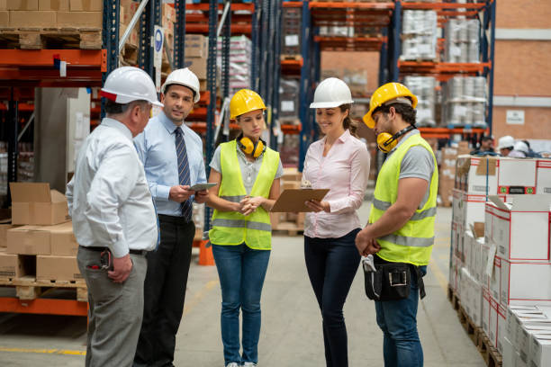 istock Business people visiting a warehouse 1191045852