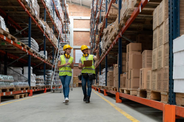 istock Team of operators working at a warehouse 1191045912