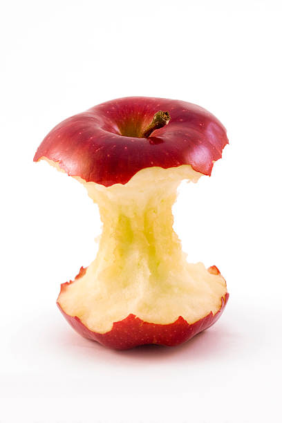 centro da maçã isolada no branco - apple missing bite fruit red - fotografias e filmes do acervo