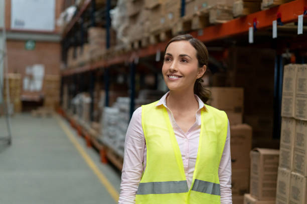 istock Operator working at a warehouse and looking at the merchandise 1191046470