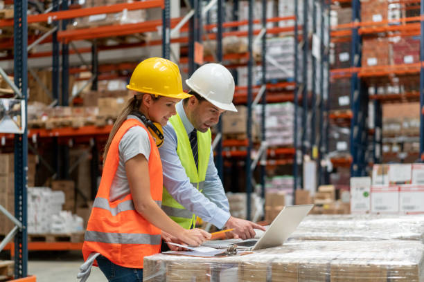istock Business man talking to an operator at a warehouse 1191046494
