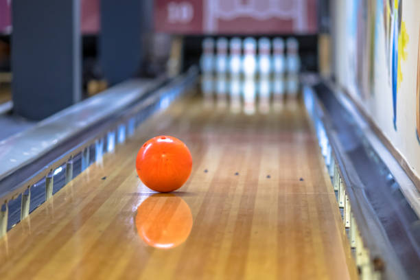 Bowling ball on alley in indoor bowling club