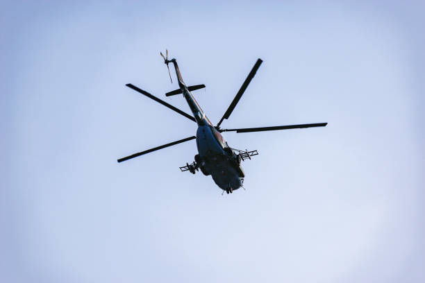 istock Military helicopter landing. 1191050936