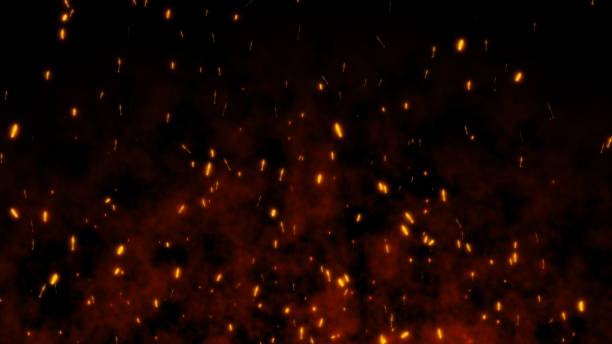 istock Burning red hot flying sparks fire in the night sky. Beautiful abstract background flying on black background. 1191052469