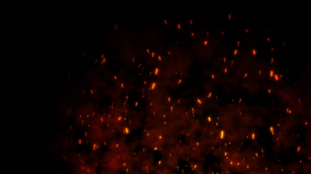 istock Burning red hot flying sparks fire in the night sky. Beautiful abstract background flying on black background. 1191052472