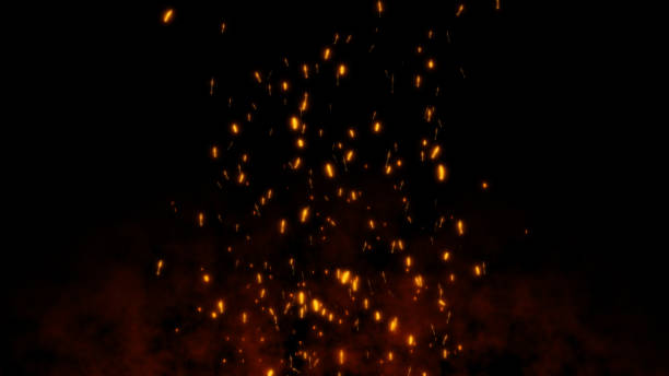 istock Burning red hot flying sparks fire in the night sky. Beautiful abstract background flying on black background. 1191052484