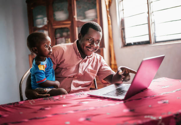 istock A Father and his baby boy looking at a laptop 1191059875