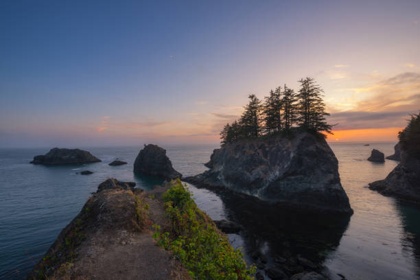 istock Sunset from Secret Beach overlook near Samual H. Boardman Scenic Corridor 1191065874
