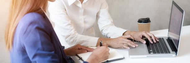istock Business team brainstorming and discussing with financial data and report graph. Teamwork meeting working concept. 1191067049