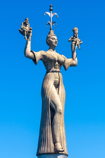 Constance, Germany – July 30, 2019: Famous statue of Imperia in harbor of Konstanz. Imperia is a landmark of city. Big female sculpture at Constance Lake (Bodensee) on blue sky background in summer.