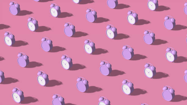 Lilac alarm clocks, pink background. Abstract art, 3d render.