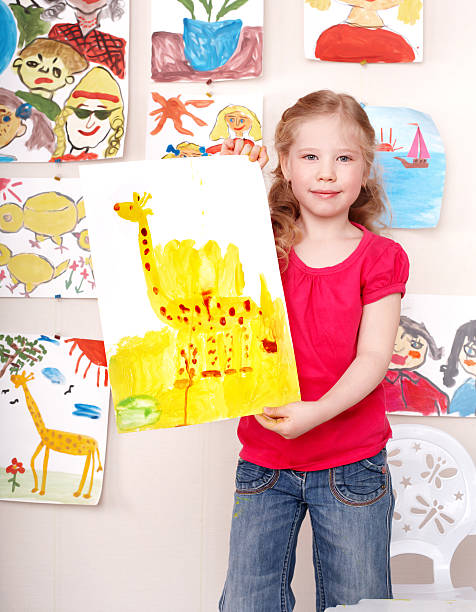 istock Child paint picture  in preschool. 119107325
