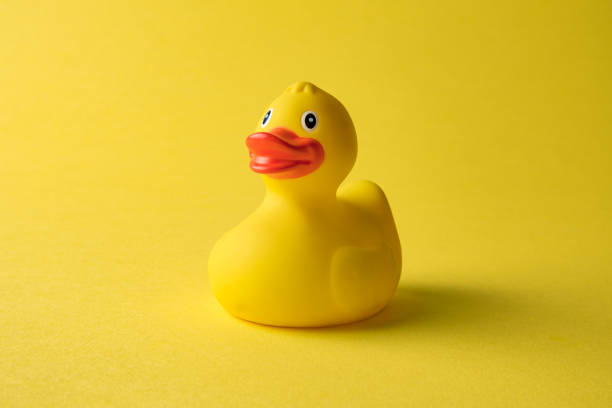 istock Rubber duck on yellow background minimal creative concept. 1191076883