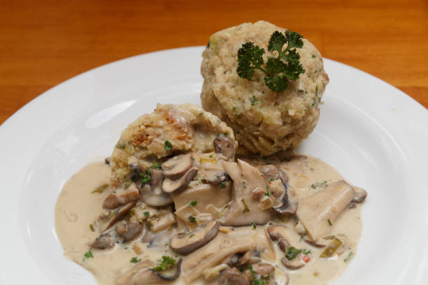 Homemade bread dumpling with mushroom ragout