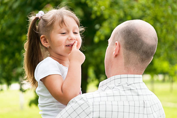 istock father and his daughter in park 119107948