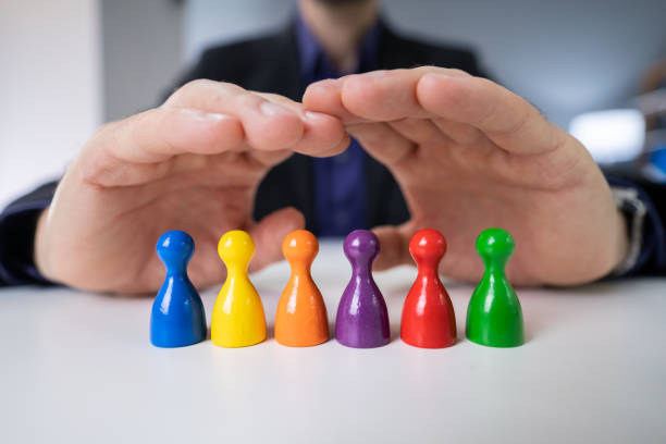 istock Protecting Colorful Pawns 1191080364