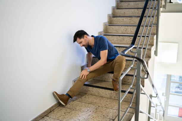 istock Man Sitting On Staircase 1191080386