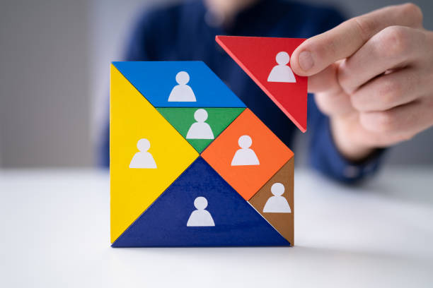 istock Businessman Building Tangram Square Block 1191081761