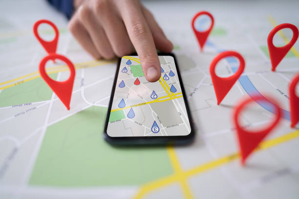 istock Map With Red Location Marker And Mobile Phone 1191081827