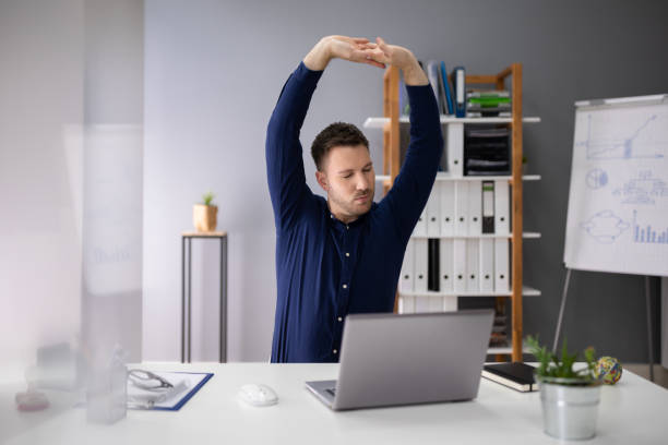 istock Businessman Stretching His Arms 1191081980