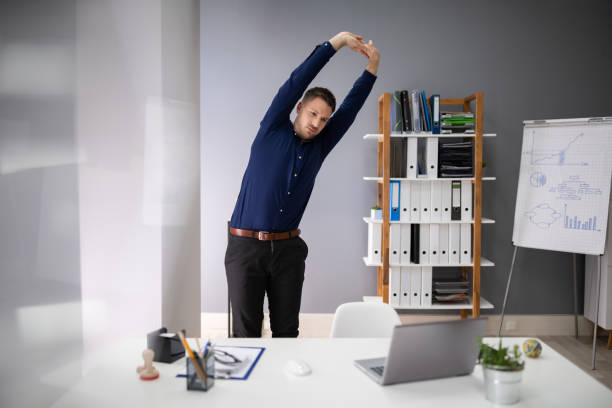istock Businessman Stretching His Arms 1191081991