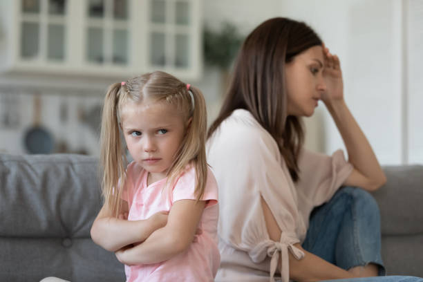 istock Naughty stubborn child daughter and mum avoid talk after argument 1191083788