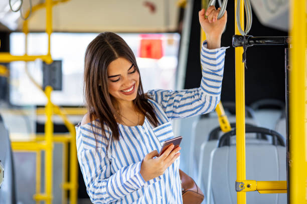 istock A young lady using a smartphone on the bus 1191084533
