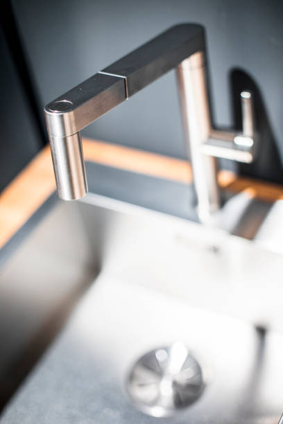 istock A modern kitchen dishwashing sink faucet 1191088602