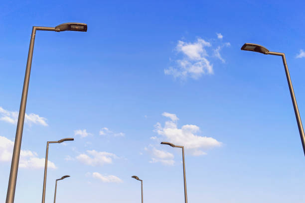 istock Electric lamp with blue sky and clouds. 1191088868