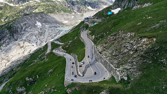 Furka Pass, Switzerland - July 13, 2019 : Aerial view of closed hotel Belvedere located in mountains near the Rhone Glacier at the Furka Pass.