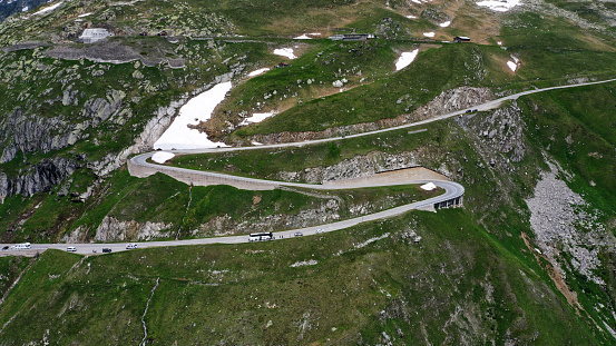 Aerial view of mountain winding road Furka pass in Alps, Switzerland.
