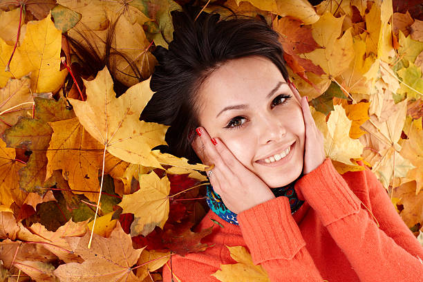 istock Girl in autumn leaves. 119109075