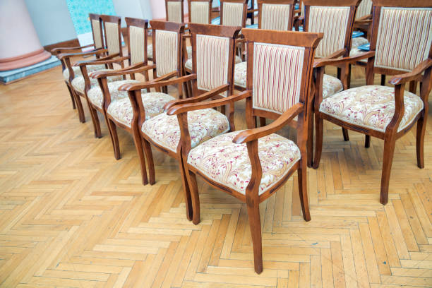 istock Elite seats, comfortable armchairs, Conference room with brown many armchairs . Many empty armchairs. 1191091478