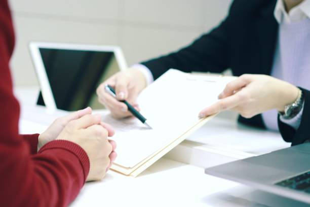 agreement application Asian woman making real estate sales contract witness signature stock pictures, royalty-free photos & images