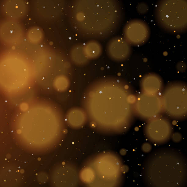 istock Gold bokeh, shiny glittering golden and silver stars 1191097733