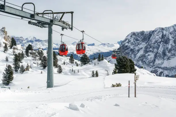 Cable cars at Dolomites of Colfosco near Val di Fassa, Trentino-Alto-Adige region, Italy.