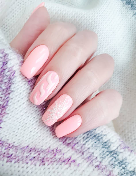 istock female hand beautiful manicure sweater 1191109896
