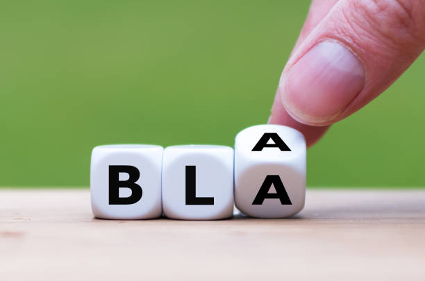 istock Hand turns a dice and changes the word 