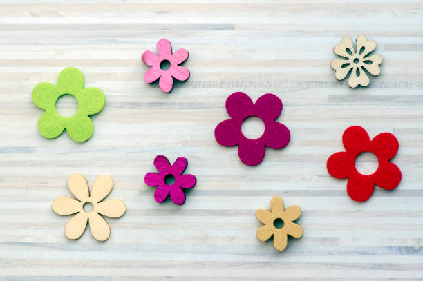 istock Wooden and textile flowers, blossoms still life, springtime Easter decoration 1191113209