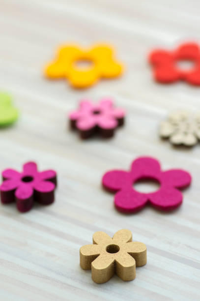 istock Wooden and textile flowers, blossoms still life, springtime Easter decoration 1191113228
