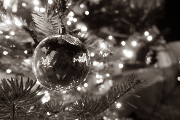 istock a shiny Christmas ball hanging from a Christmas tree as a decoration 1191117155