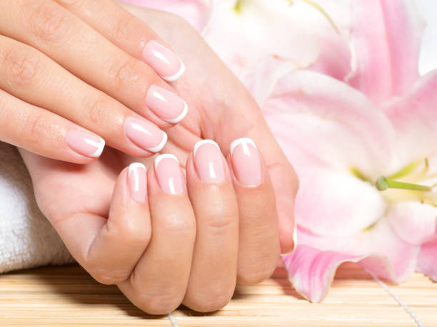 istock Beautiful woman's nails with french manicure 1191117257