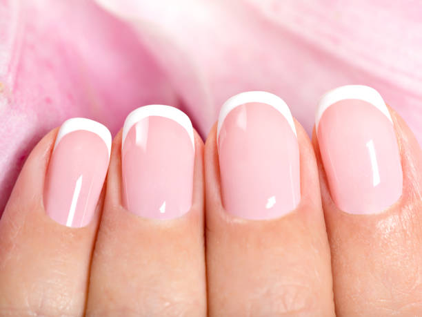 istock Beautiful woman's nails with french manicure 1191117258