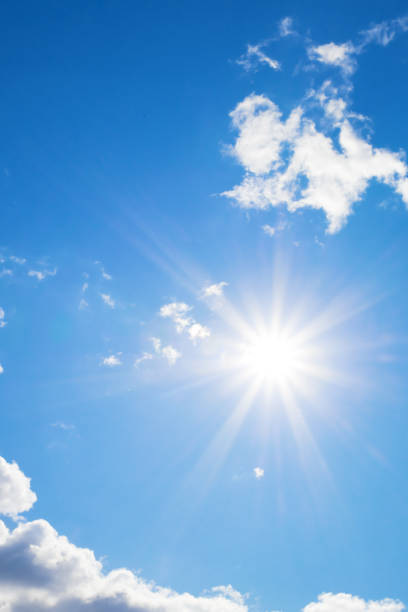 istock Bright sun with beautiful beams in the sky with clouds 1191120007