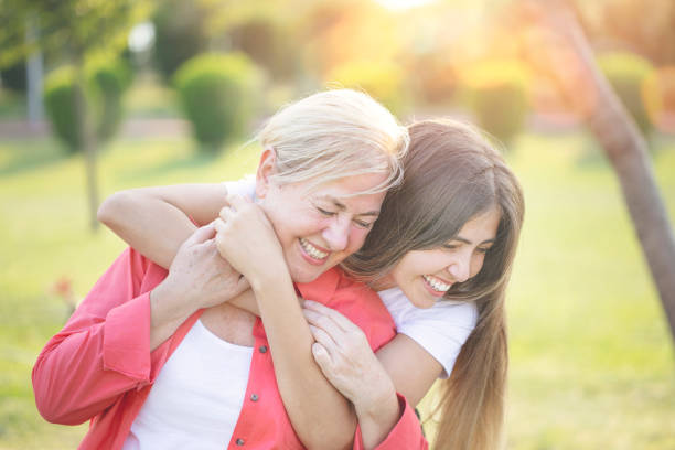 istock Smiling mother with young daughter 1191120143