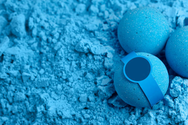 Blue bath bombs with sticker on mixture background Blue bath bombs with sticker on dry mixture background, close up view 11904 stock pictures, royalty-free photos & images