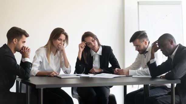 istock Overworked upset group of diverse people dissatisfied with work results. 1191132582