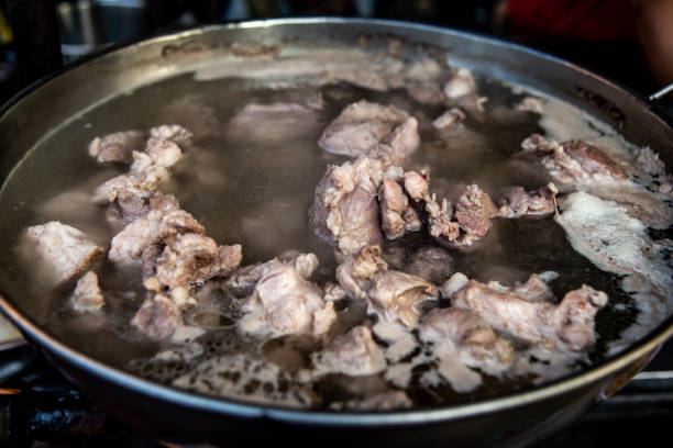 istock Boiling pork rip soup in hot in pot boiling water. 1191133685