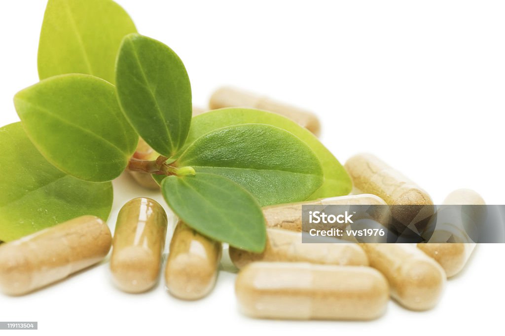 sprout vert de cachets - Photo de Complément vitaminé libre de droits